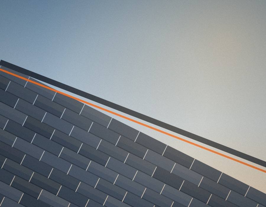 Illustrative sample image for a fictional website concept: a roof edge with new orange flashing against a clear sky.